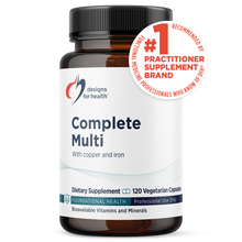 An amber supplement bottle with a black cap and white label reads Complete Multi with copper and iron, 120 vegetarian capsules.
