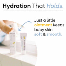 White tube and box of Aldermis Baby Probiotic Ointment with yellow floral branding displayed on white surface.