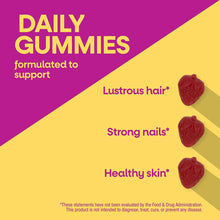 Red berry-shaped gummies on magenta and yellow background with text describing daily gummy benefits.