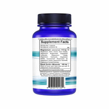 Blue bottle with black cap containing magnesium supplement capsules, labeled with supplement facts and ingredients.
