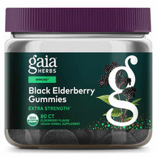 Bottle of black elderberry gummies by Gaia Herbs with purple cap, dark label, and 80 count, containing dark round gummies vis