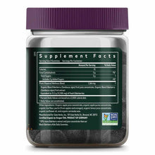 Bottle of dark purple gummy supplements with purple cap and green label showing supplement facts.