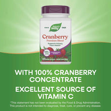 Nature's Way Cranberry Premium Blend bottle with purple cap containing 120 vegan capsules on green background.