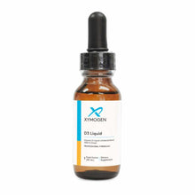 Amber glass bottle with black dropper cap labeled "D3 Liquid" by Xymogen, 1 fluid ounce.