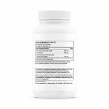 White capsule bottle with ribbed cap displaying Thorne Research Deep Sleep Complex supplement facts label.