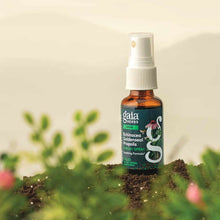 Amber glass bottle with white spray top and green label reading "Gaia Herbs Echinacea Goldenseal Propolis Throat Spray."