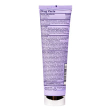 Purple tube of SPF 30 daily moisturizer with Drug Facts label and white cap.