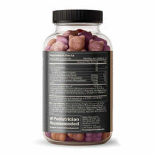Clear glass bottle filled with pink, brown, and purple gummy supplements with black screw cap and label.