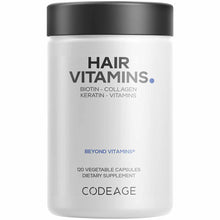 White bottle with black cap labeled "Hair Vitamins" containing 120 vegetable capsules by Codeage.