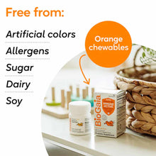 BioGaia Immune Active Kids probiotic bottle and box displayed with almonds and toothbrushes, listing free from artificial col