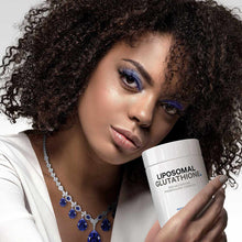 White jar labeled "Liposomal Glutathione" held by a woman with curly dark hair and blue gemstone necklace.