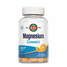 Bottle of Kal Magnesium Gummies with white cap containing orange-colored gummies visible inside.