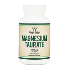 White bottle of Double Wood Supplements Magnesium Taurate dietary supplement containing 210 capsules at 1500 mg per serving.