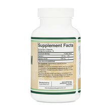 White supplement bottle with green band and tan label showing Supplement Facts for Magnesium Taurate by Double Wood Supplemen