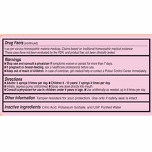 Product label with Drug Facts section showing warnings, directions, and inactive ingredients on pink background.