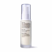Clear pump bottle of beige face cream with purple-tinted plastic cap and product information label on white background.