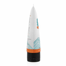 White and black tube with orange band containing Redmond Clay Facial Mud with Silver product.