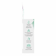 Four essential oil bottles with purple and green labels in a white cardboard box displaying product information and icons.