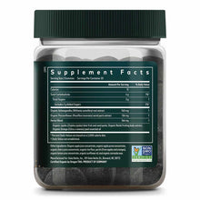 Bottle of dark gray sleep gummies with green cap and label showing supplement facts and ingredients.