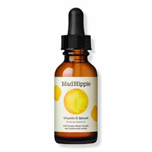 Mad Hippie Vitamin C Serum in amber glass bottle with black dropper cap and cream label featuring yellow citrus imagery.