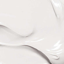 Creamy white body lotion with smooth texture swirls.
