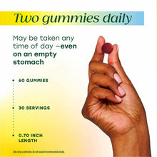 Hand holding round burgundy and pink gummies with product details on yellow and blue background.
