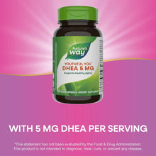 Dark glass bottle with green cap labeled "Nature's Way Youthful You DHEA 5 MG" containing 60 vegan capsules on pink backgroun