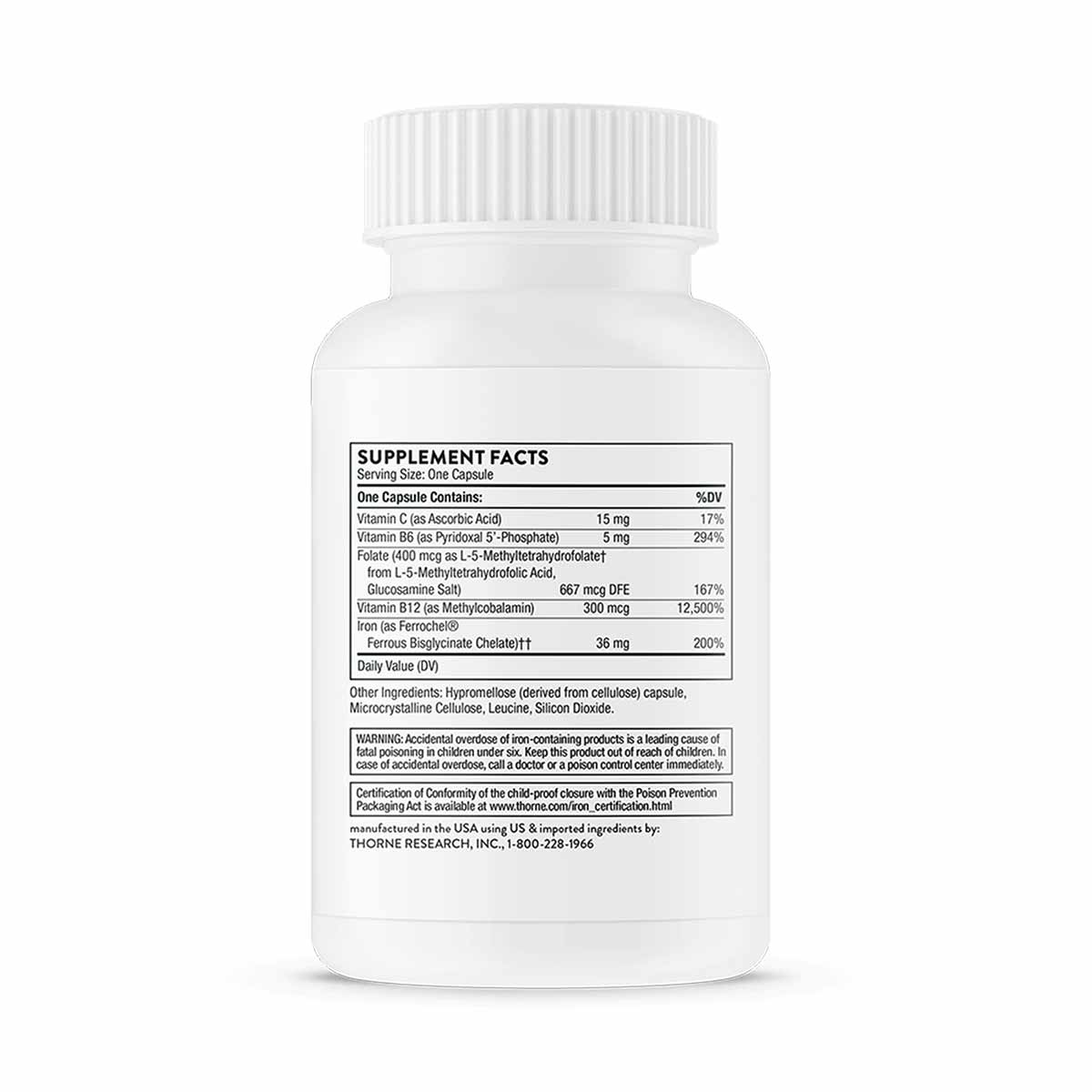 White bottle of Advanced Iron Complex supplement capsules with printed supplement facts label and Thorne Research branding.