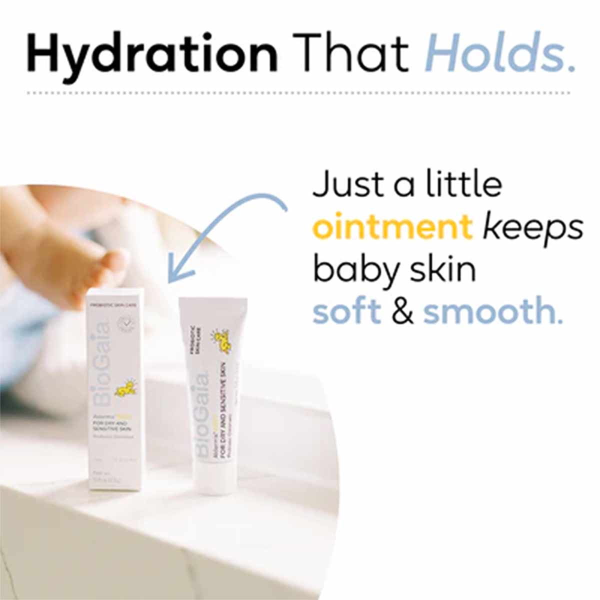 White tube and box of Aldermis Baby Probiotic Ointment with yellow floral branding displayed on white surface.