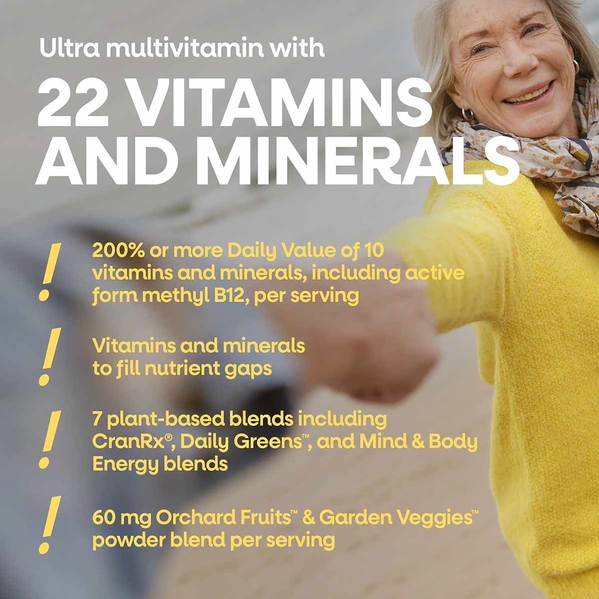 Alive Once Daily Women's 50+ multivitamin bottle displayed next to smiling older woman wearing yellow cardigan.