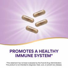 Four gold-toned vitamin capsules arranged on a purple and white background.