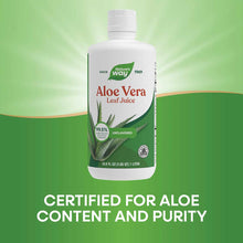 White plastic bottle of Nature's Way Aloe Vera Leaf Juice with green leaf logo and white cap against green background.