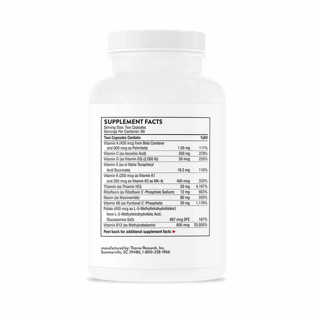 White plastic bottle of Basic Nutrients 2/Day multivitamin capsules by Thorne Research with supplement facts label.