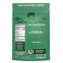 Back of a green meat stick pouch showing a grazing cow illustration, nutrition facts, ingredients list, brand story text, and a barcode.