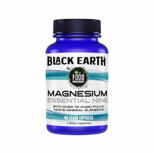 Blue glass bottle of Black Earth Magnesium Essential Nine dietary supplement with black cap and white label featuring turquoi