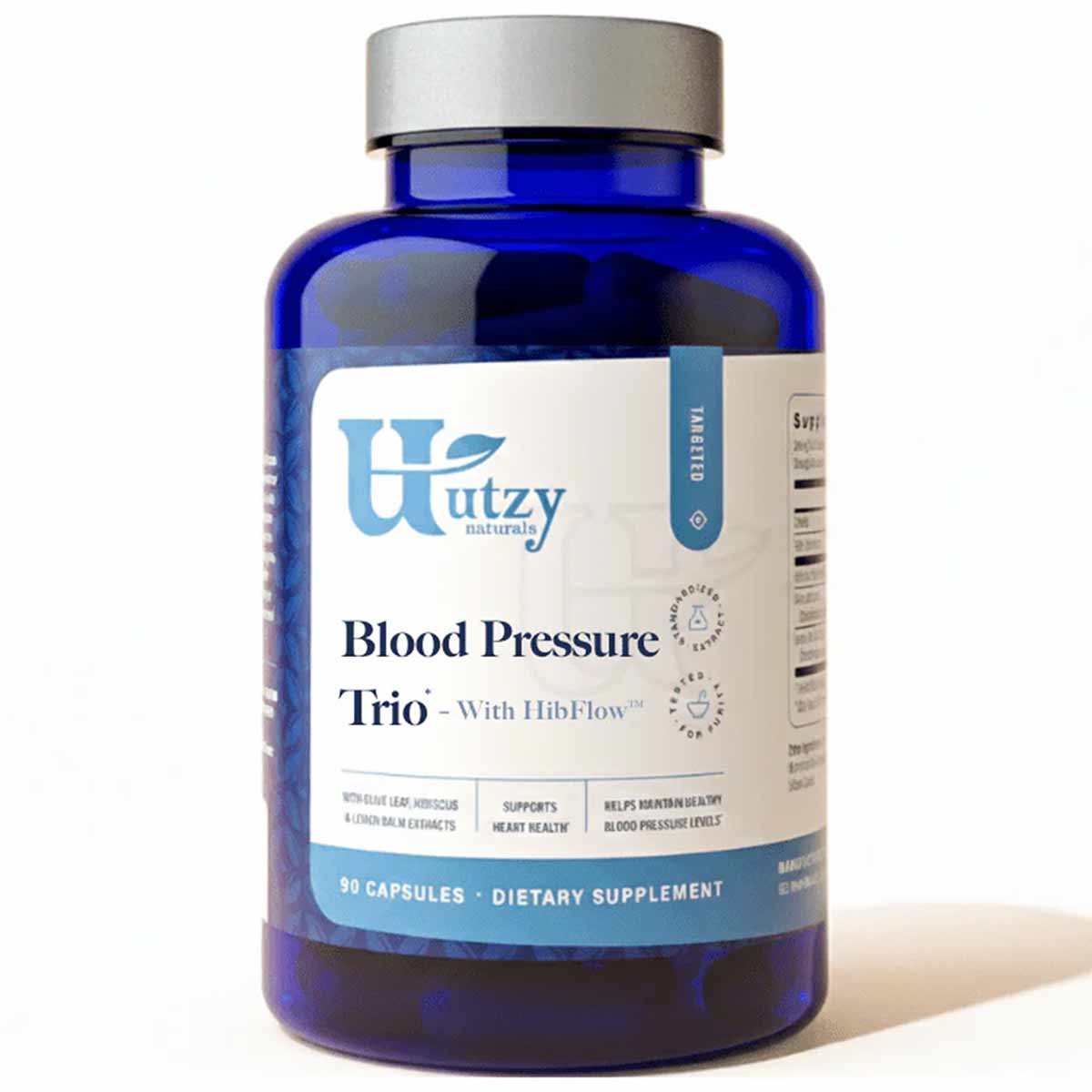 Blue glass bottle with silver cap containing 90 capsules of Utzy Naturals Blood Pressure Trio dietary supplement.