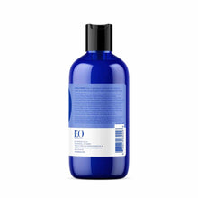 Blue plastic bottle of EO Products bubble bath with black cap and white label showing product information.