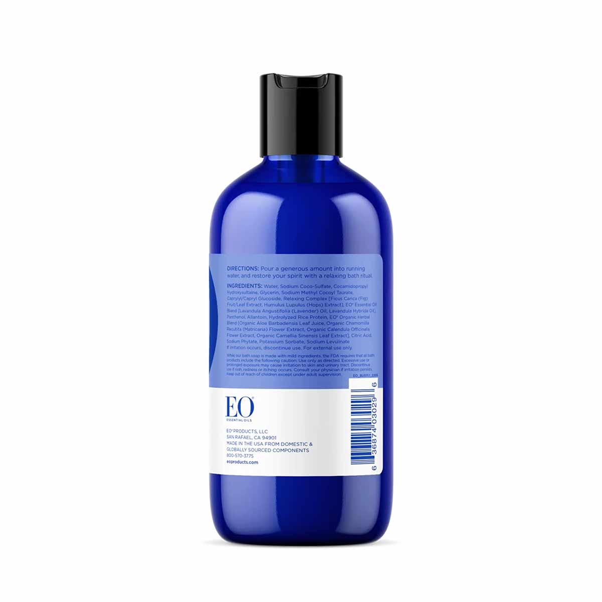 Blue plastic bottle of EO Products bubble bath with black cap and white label showing product information.