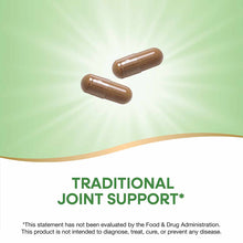 Two brown herbal supplement capsules on a green and white background.