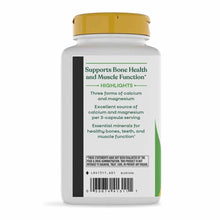 White bottle with gold cap containing Nature's Way Calcium & Magnesium Mineral Complex supplement capsules.