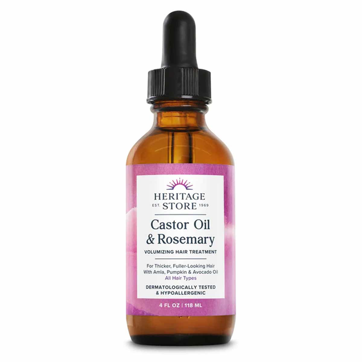Amber glass bottle with black dropper cap labeled "Heritage Store Castor Oil & Rosemary" volumizing hair treatment, 4 fl oz.