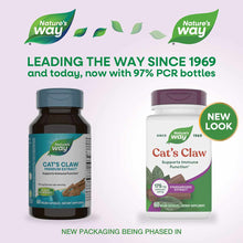 Two Nature's Way Cat's Claw Premium Extract supplement bottles: older dark teal design (left) and new white design (right) wi