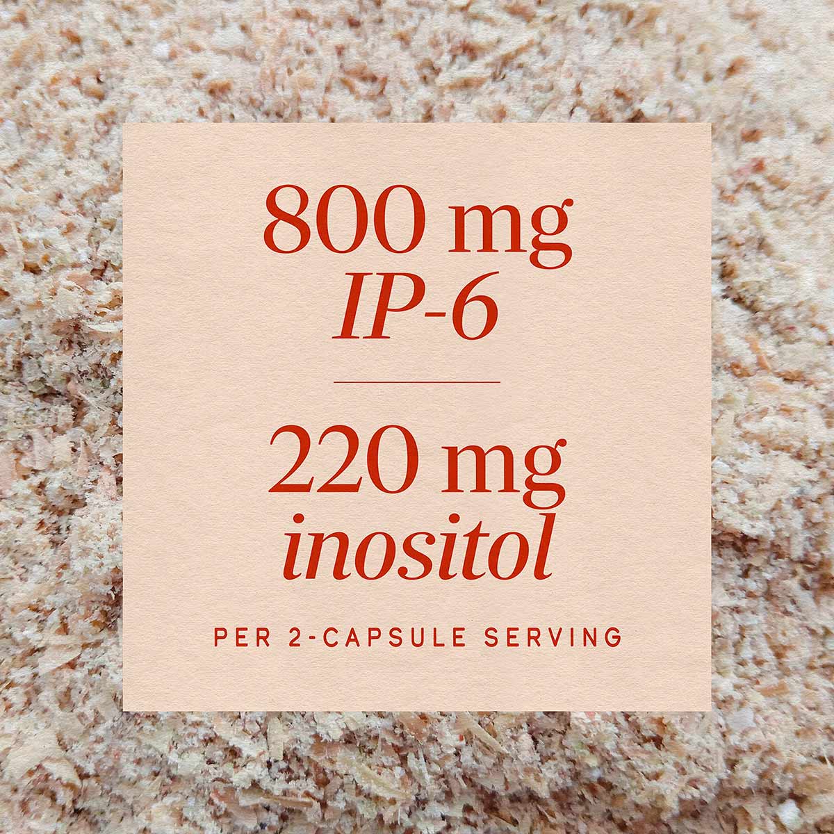Supplement label showing "800 mg IP-6" and "220 mg inositol per 2-capsule serving" in red text on cream background.
