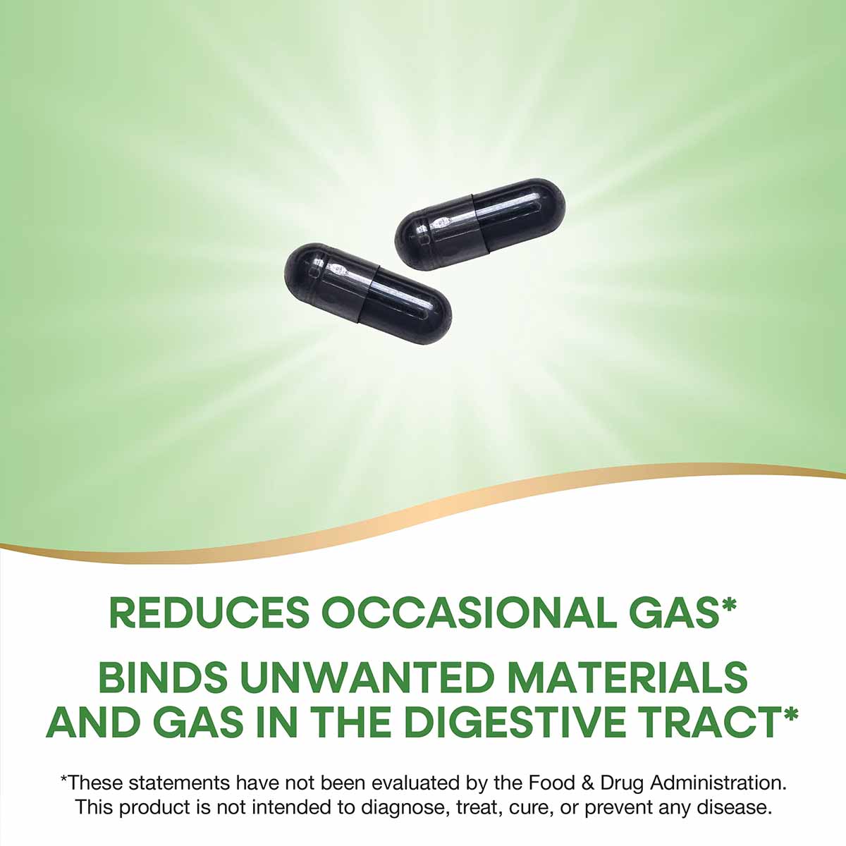 Two black activated charcoal capsules on a green and white background.