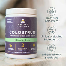 White and purple colostrum supplement powder container labeled Coconut Lime by Ancient Nutrition with product feature icons.