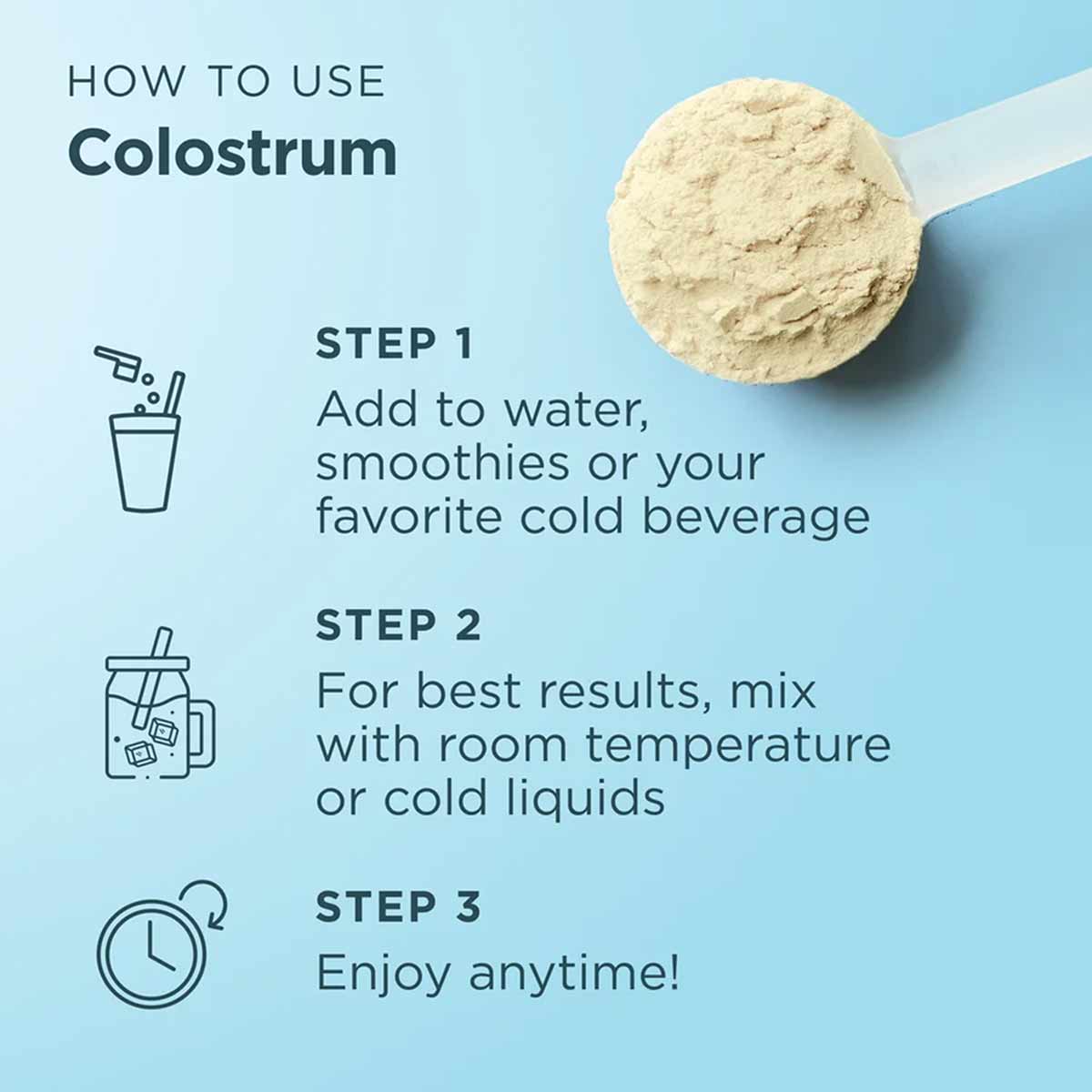 Cream-colored colostrum powder on a spoon with usage instructions on light blue background.