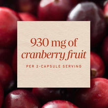 Cream-colored label stating "930 mg of cranberry fruit per 2-capsule serving" overlaid on fresh cranberries.