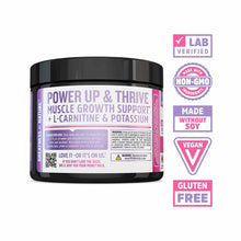 Black container of Zhou Nutrition creatine powder with purple label displaying muscle growth support formula and certificatio