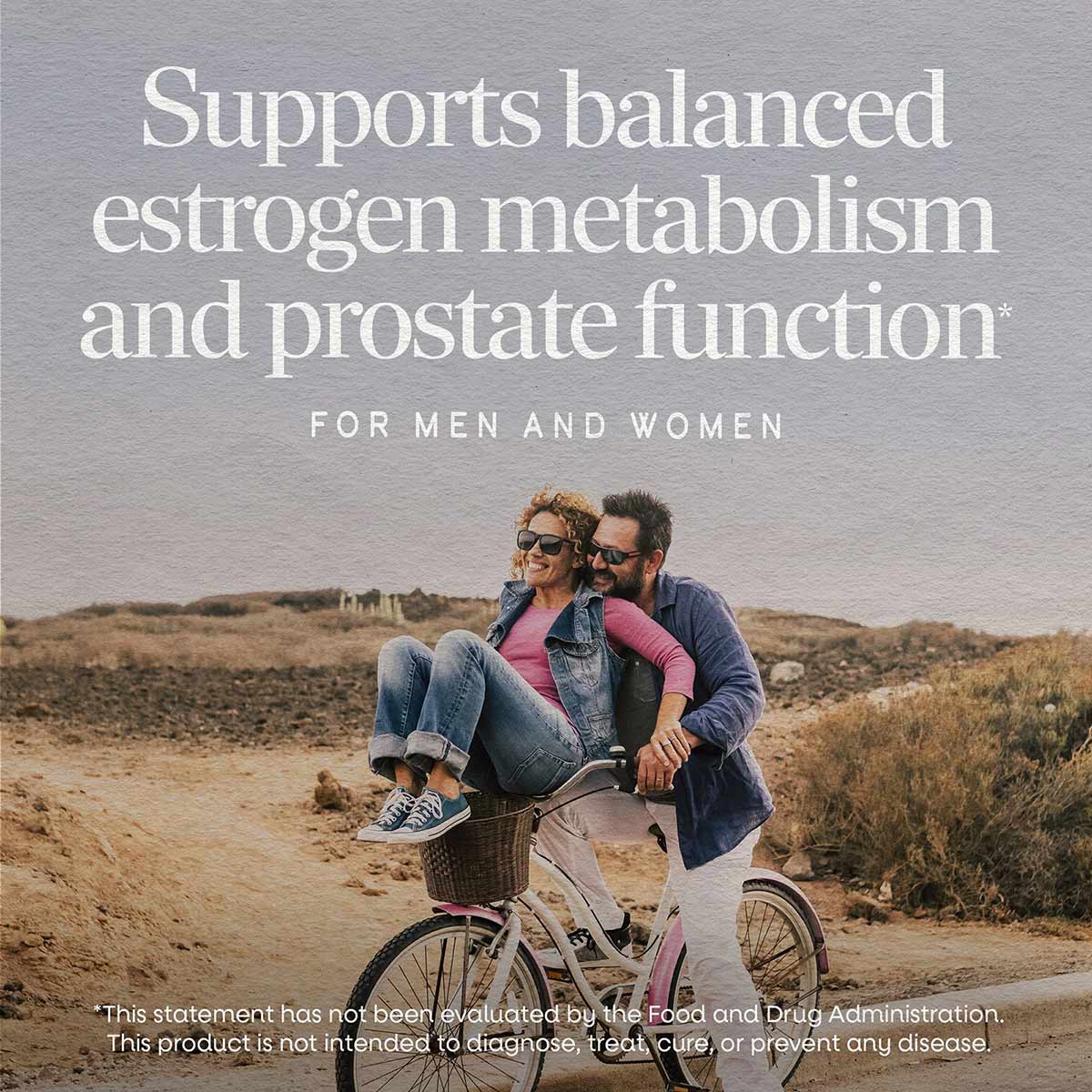 Two adults on a bicycle in a desert landscape with text overlay about estrogen metabolism support for men and women.