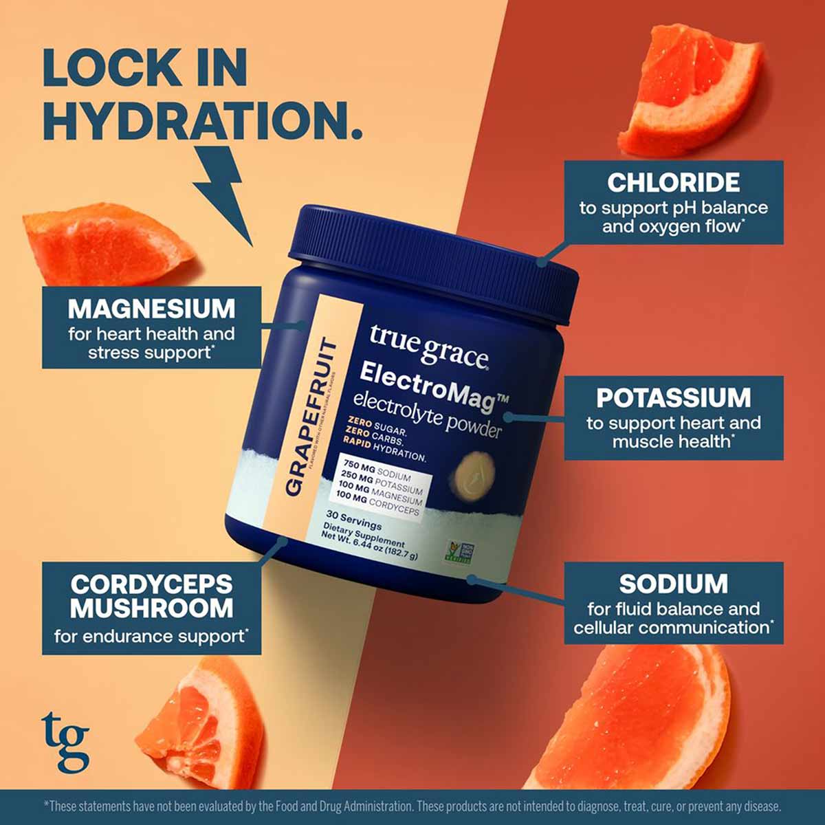 Dark blue canister of True Grace ElectroMag electrolyte powder surrounded by grapefruit slices on split peach and rust backgr